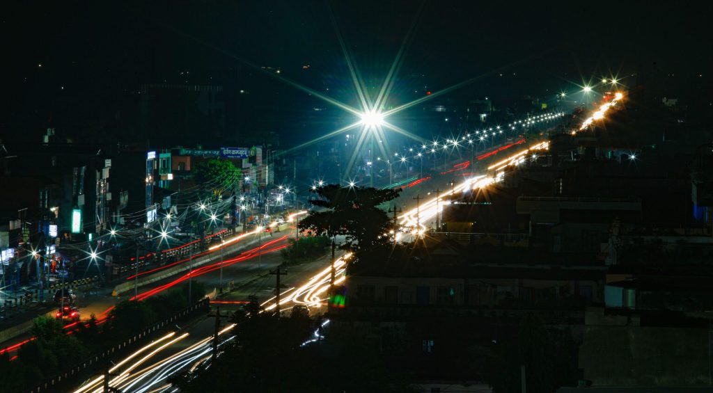 A long exposure shot of Nepalgunj-Kohalpur highway taken at night in Kohalpur, Nepal on October 11, 2022. The 22.2 kilometers from Nepalgunj-Kohalpur stretch is ADB-supported and was completed in 2018. After the completion of the roads, it has improved border crossing access roads, trade, customs, and trans-shipment with better networks between Nepal and India and other third countries. Photo: Skanda Gautam/Asian Development Bank